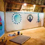 Dreamsea Costa Rica Surf Camp | backpacking, travel, hostel, surf, and yoga camp | Media Files | Lifestyle Image of Surf and Yoga Camp Resort | wall art in a villa at Dreamsea Surf Camp on a beach in Tamarindo, Costa Rica